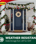 Front door decorated with garland and lights, showcasing Command hooks, 3M logo, weather resistant text, winter scene.