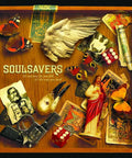 Album cover with mixed objects, including butterflies, dice, and a figure. Features text "Soulsavers, It's not how far you fall."