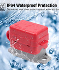 Dual Pack 30A 12V Circuit Breakers With Clear Covers And Red Indicators viewed in water, showing durable red vinyl cover for protection.