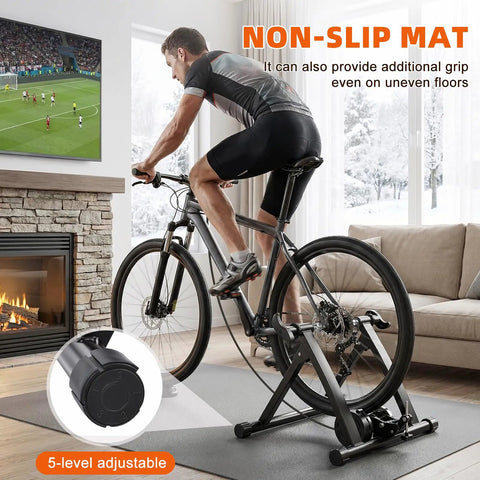 Man using Indoor Magnetic Bike Trainer Stand with Six Level Resistance in living room with front wheel riser block.