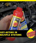 Hand holding All In One Stop Leak For Engine, Transmission, Power Steering And More, 8 Oz Bottle, Stops Leaks Across Multiple Systems, Rejuvenates Seals, Gaskets And O Rings, Prolonging Lifespan And Preventing Future Leaks in engine bay
