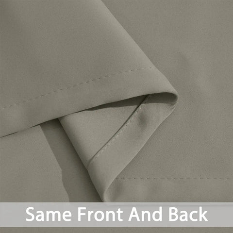 Close-up of taupe fabric showing the same front and back texture of Room Darkening Blackout Curtains 52 By 84 Inches Taupe Two Panels With Grommets For Bedroom Thermal Insulated Light Blocking Drapes Block Up To 85 To 99 Percent Of Light For Deep Sleep Privacy And Cozy Comfort.