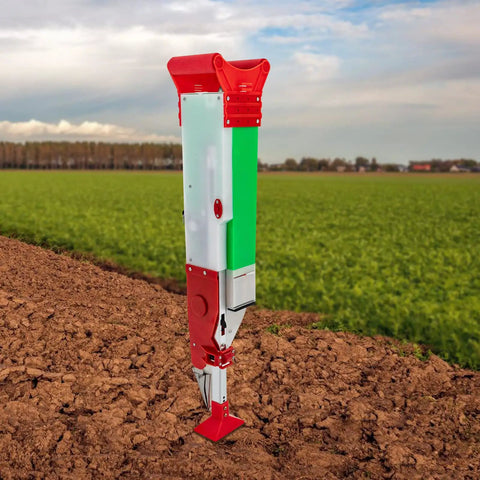 Handheld Garden Seeder Tool For Corn Peanuts Beans And Cotton Adjustable Manual Planter on field soil background