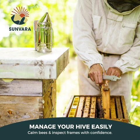 Beekeeping Starter Kit With Smoke Tool and Full Hive Essentials being used by beekeeper near hive with bee smoker on wooden surface