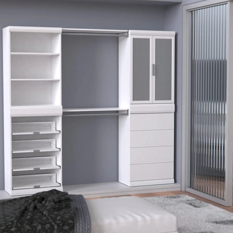 Slick White Modular Storage Organizer Kit With Adjustable Hanging Rods Roomy Shoe Cubbies Four Stackable Drawers Three Tier Shelving And Secure Door Cabinet in modern room.