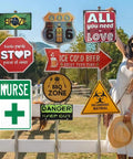 First Aid Station Nurse Symbol Safety Warning Sign 8x12 Aluminum Plaque in outdoor setting among decorative signs