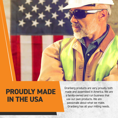 Front view of a construction worker in a hi-vis vest and white hard hat with sunglasses, in front of an American flag.