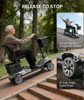 Go-To Long Range Folding Mobility Scooter For Seniors And Adults, 28.5 Mile Electric Power Ride, 265 Lbs Capacity, Smart Electromagnetic Brake, 8 Inch Puncture-Proof Wheels All Day Comfort Easy Fold Portable Design Silver showing man riding on park path with features highlighted.