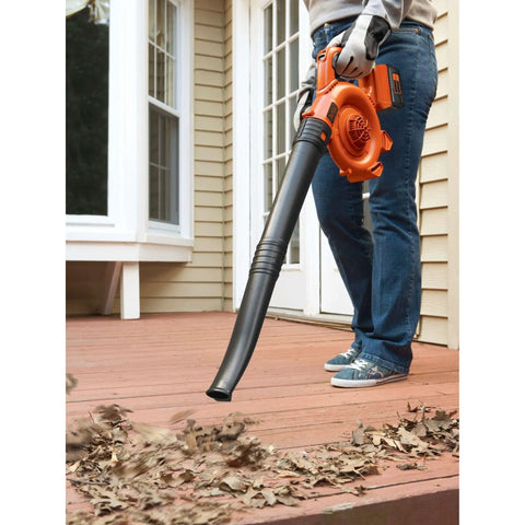 Person using Cordless Leaf Blower With Battery And Charger, 40V Max PowerCommand, 120 MPH Peak Air Speed, 90 CFM on wooden deck