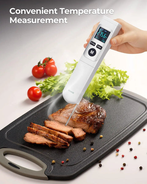 2-In-1 Infrared Thermometer Gun With Meat Probe measuring steak temperature on cutting board with vegetables