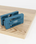 AU93 Edge Banding Trimmer With Dual Edge Cutting on wood laminate, showcasing PVC and veneer trimming capabilities.