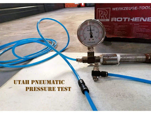 1/4 Inch Air Line Fittings Straight Push To Connect Air Hose Fittings testing setup with pressure gauge in industrial setting