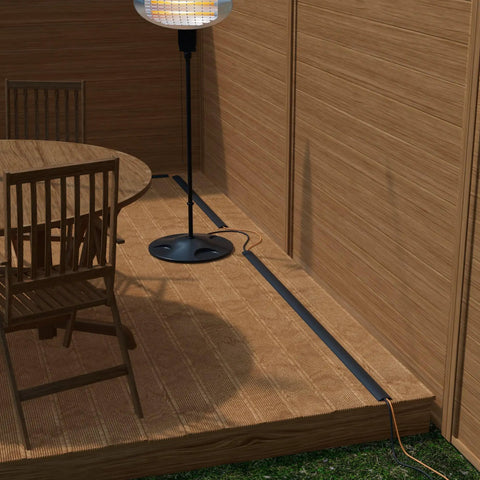 30Ft Floor Cord Cover And Cable Protector for Home Office on wood deck, demonstrating flexible PVC cable management, black color.