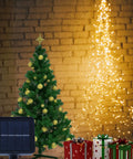 Solar Powered Fairy Lights Outdoor Waterproof 200 LEDs Copper Wire String Lights With 8 Modes Waterfall Style Firefly Vine Lights For Garden Trees Christmas Decor Dope Mom Gift displayed with Christmas tree and gifts