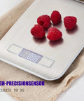 High Precision Kitchen Scale For Baking And Cooking Enthusiasts With Five Unit Options Oz Lb Oz Fl Oz G Ml displaying raspberries