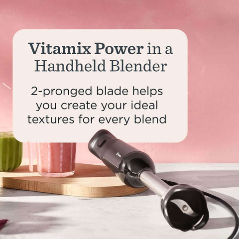Slick Two Speed Immersion Blender With Whisk Attachment And Knockout 350 Watt Motor For Effortless Soup Blending Sauce Crafting And No Fuss Smoothie Mixing In Modern Black on a kitchen countertop.