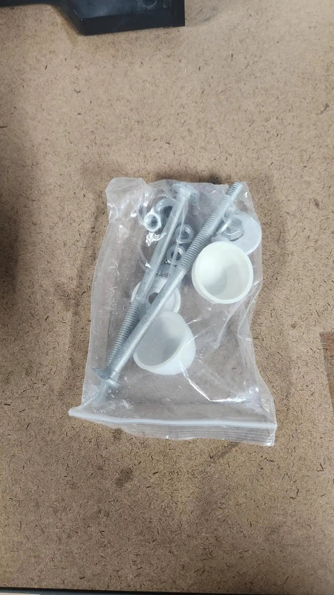Bag of screws and caps from the 3.5 Inch Toilet Height Spacer Kit For Easy Under Base Install Lifts Most 14 Or 15 Inch Toilets Boosts Comfort And Accessibility In The Bathroom No Frills Upgrade That Keeps Your Existing Toilet In Place