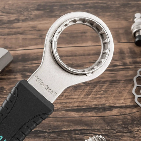 Close-up of 4 In 1 Bicycle Bottom Bracket Tool for Quick Removal and Installation, featuring durable steel and 16-notch design.