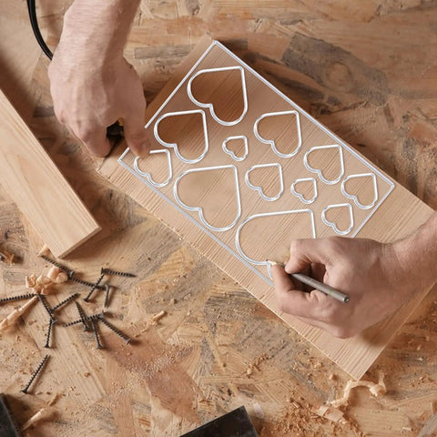 Heavy Duty Acrylic Heart Router Template For Practical Woodworking And Charcuterie Boards Features Twelve Cut Sizes with detailed heart patterns.