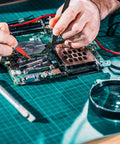 Person using Soft Silicone Electrician Test Leads Kit Pro Grade Heavy Duty Built Tough CAT III 1000V CAT IV 600V on circuit board