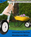 Person pushing wheelbarrow with Flat Free Wheelbarrow Tire And Wheel 14.5 Inch 4.80/4.00-8 With 5/8 Bore on grass