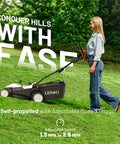 18 Inch Electric Self Propelled Cordless Lawn Mower With Brushless Motor, Lightweight Yard Workhorse No Fuss, 6 Height Settings From 0.98 To 2.95 Inches, Dual 20V 4.0Ah Batteries Included, Easy Start, Low Maintenance Lawn Care, woman mowing sloped lawn