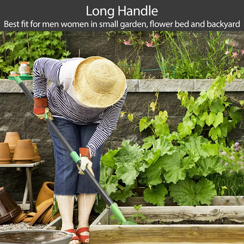 Person using Beastly Heavy Duty Thatch Rake For Lawns With 54 Inch Handle in garden with raised bed and plants.