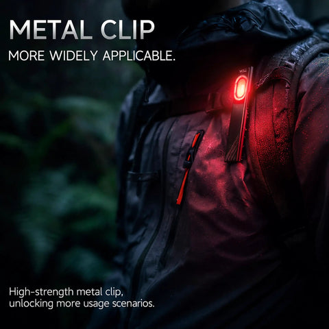 Ultra Thin Rechargeable Flashlight 700 Lumen Magnetic Work Light on jacket with red light in forest