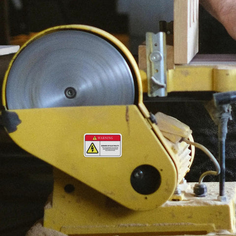 Circular saw with PVC Mechanical Safety Warning Stickers Set 10pcs High Visibility Danger Decals For Machinery Equipment Prevent Accidents In Warehouses And Construction Sites Electrical Panel And Static Electricity Signs attached.