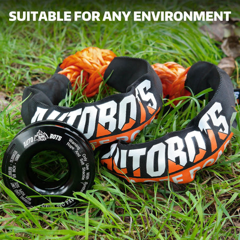 Soft Shackle Recovery Kit 3/4 Inch By 24 Inch 66,200 Lb Break Strength Two Pack With Snatch Ring on grass surface
