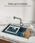 Water tank and cooling pad of Portable 3-In-1 Evaporative Air Cooler being cleaned in sink