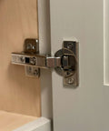 Shop Ready European Concealed Cabinet Hinge Screws 1000 Count Flat Head Phillips Type 17 Tip installed on cabinet hinge.