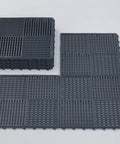 9 Pack 12 Inch Square Interlocking Floor Tiles With 0.4 Inch Thick Dark Gray Non Slip Mats And Drainage Grooves For Pool Deck Shower Bathroom Garage Boat And Other Wet Areas Highly Grippy And DIY Friendly stacked and displayed.