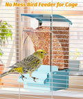 Foolproof Transparent Bird Feeder With Sturdy Perch, Spill Proof Acrylic Cage Food Container For Budgies Cockatiels And Parakeets, Hassle Free No Mess Daily Feed Dispenser Blue with a bird perched on it.
