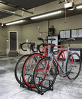 Three Bike Floor Stand For Garage And Home, No Fuss Parking Rack For Indoor Outdoor Storage, Fits 22 To 28 Inch Wheels