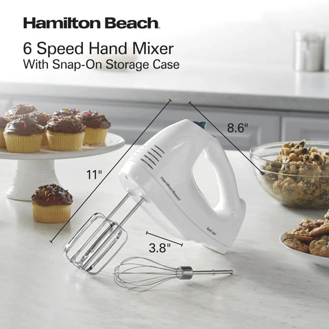 Hamilton Beach 6 Speed Electric Hand Mixer With Quick Burst And Bowl Rest Snap On Storage Case holding beaters and whisk.