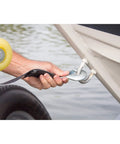 Beefy 2 Inch Heavy Duty Winch Strap With Hook, 25 Feet Long, 4000 Lbs Break Strength, Fits Winches Up To 2600 Lbs, 150 Percent Rating, Perfect For Trucks, Trailers, Off Road Recovery. Hand attaching winch strap hook to boat trailer anchor.