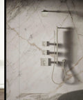 Parallel Single Function Showerhead In Vibrant Brushed Nickel, 2.5 GPM At 45 PSI, mounted on marble wall with hose attachment