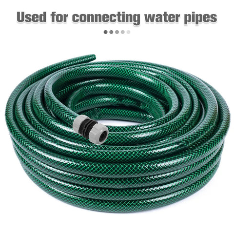 Get Your Garden Hose Back In Action With This Sturdy 4 Piece Repair Kit Featuring Quick Connect Adapters That Make Installation A Breeze For Watering Plants And Keeping Everything Leak Free. green coiled hose with gray plastic quick connect adapter