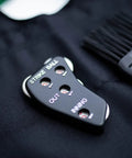 Umpire Gear Kit With 4-Dial Indicator, Plate Brush, And Pro-Style Cloth Bag For Baseball Games on black cloth surface