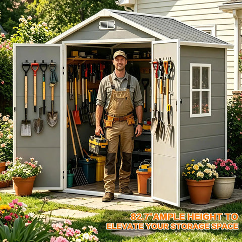 Person standing in front of 6x4 Ft Outdoor Resin Storage Shed With Floor And Window, All Weather Waterproof Plastic Garden Tool Shed With Lockable Double Doors And Ramp For Mower And Bike, Backyard Storage Gray, tools hanging inside