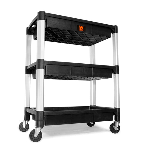Triple Deck Utility Cart With Three Wide Trays And Dual Handles Does No Sweat Rolling Through Garages Holding Three Hundred Pounds On Steel Frames Features Swivel Casters With Foot Brakes For Secure Tool Transport And Easy Stashing
