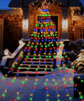Outdoor Christmas Star Lights 11.5 Foot String With 317 LEDs Multicolor 8 Modes And Timer Deck Out Your Yard And Tree For Christmas Parties Weddings And Holiday Lighting installed on house facade