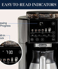 TrueBrew Drip Coffee Maker With Built-In Grinder And Bean Extract Technology showing control panel and easy-to-read indicators.