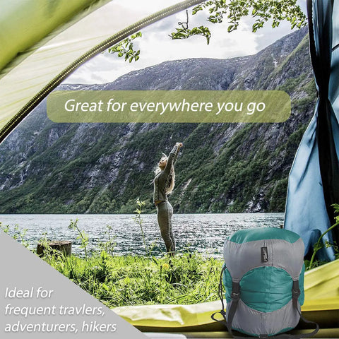 Ultralight Compression Sack For Sleeping Bags And Packable Gear Space Saving Stuff Sack For Camping Hiking And Backpacking 210T Tear Resistant Polyester Turquoise Small in scenic outdoor setting.