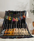 Cozy Music Lover Blanket For Guitar And Bass Fans A Soft Fleece Throw That Feels Plush And Lightweight Yet Warm Perfect For Lounging On The Couch Or Decorating A Room Sized 50 By 40 Inches Great Gift For Any Music Fan draped over a sofa.