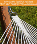Close-up of 12 Ft Double Rope Hammock With 13 Ft Brown Wooden Arc Stand For Outdoor Patio And Poolside Chill Session, showing cotton ropes and metal ring attachment.