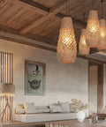 Boho Rattan Pendant Light Fixture, handwoven wicker hanging lamp illuminating rustic living room with cozy retro island glow.