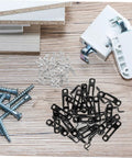 Thirty Piece Hassle Free Furniture Connector Slide Buckle With No Sweat Tool Free Snap On Kit For Couch Sofa Wardrobe Cabinet And Bookshelf Hidden Joint Fastener Easy Home Diy Fix, assorted hardware including black connectors and screws.