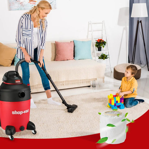 Woman vacuuming living room with wet dry vacuum, child playing, showcasing 2 Pack Dacron Cloth Filter Replacements For Most Wet Dry Vacuums 5 Gallon And Up, Durable Replacement Filters For Heavy Duty Cleanup And Dust Collection At Home In The Garage And Workshop.
